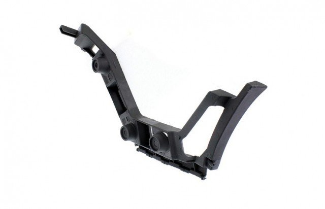 Acessar a peça Suporte central direito para choques traseiro